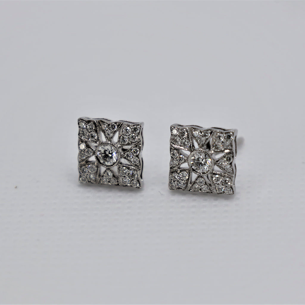 White gold intricate earrings