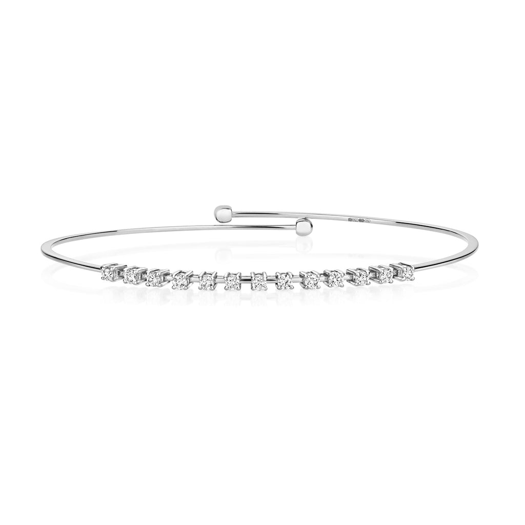 DIAMOND CLAW SET FLEXI BANGLE IN 18CT WHITE GOLD