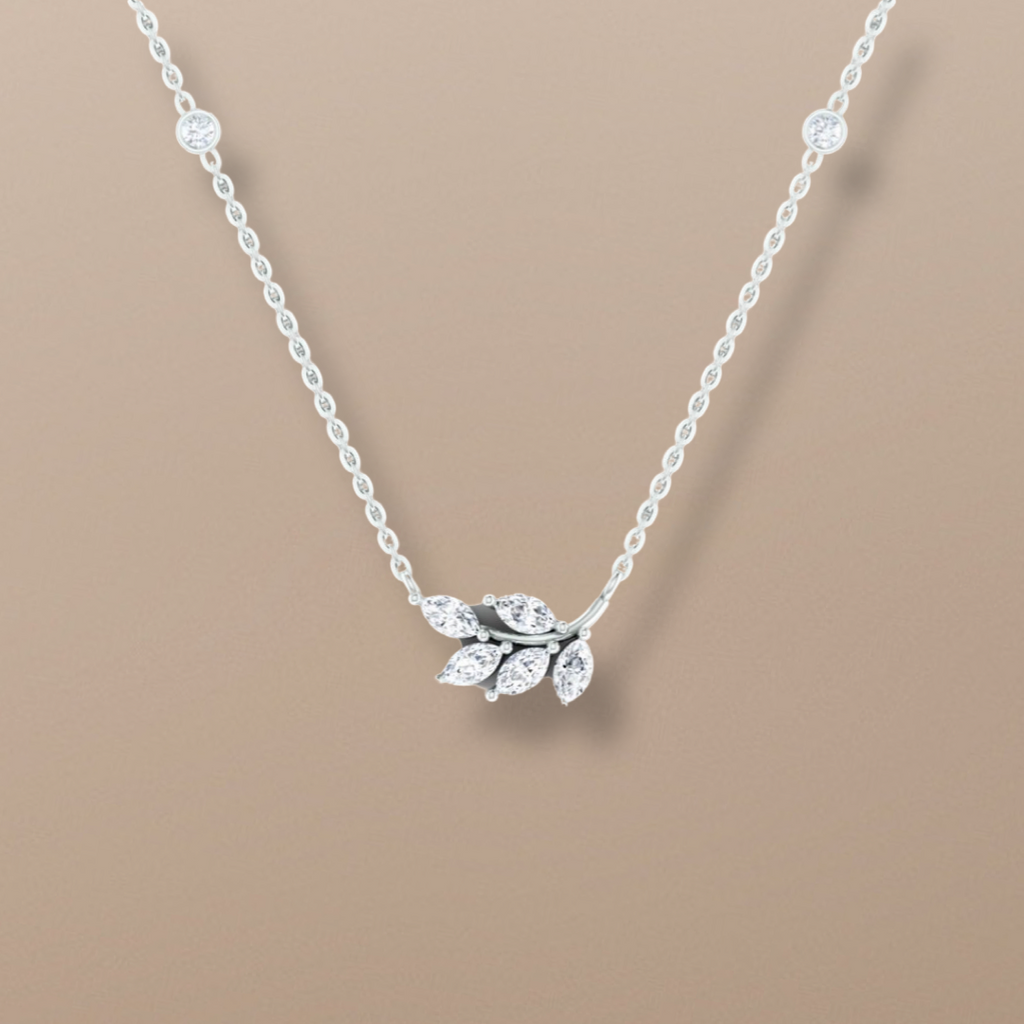 18ct White Gold Diamond Leaf Necklace, 1ct Marquise Cut Diamond, timeless piece, expertly crafted, delicate leaf design, sparkling centerpiece, glamorous evening event, casual daytime outing, durable, long-lasting, skilled artisans, highest quality materials, perfect gift, special occasion, elegant design, stunning diamond centerpiece, lasting impression