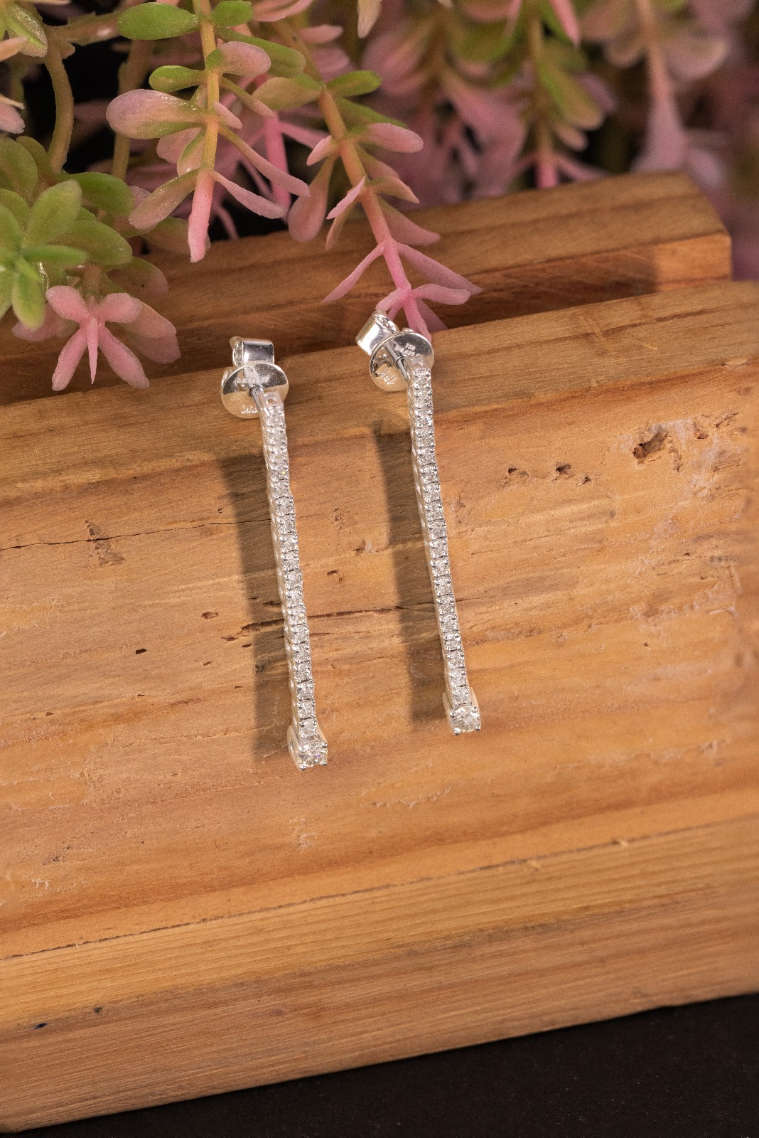 Elegant white gold tennis diamond earrings