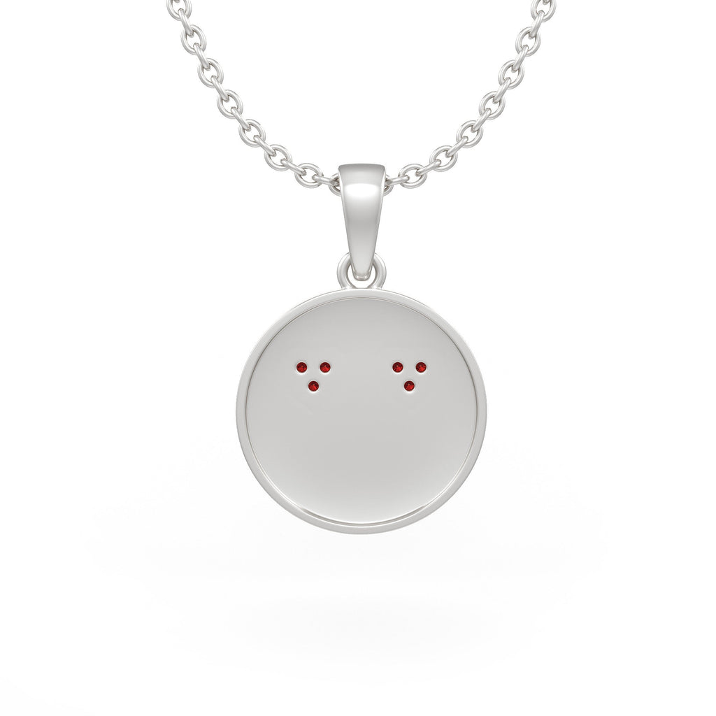 Diamond set smiley face pendant in polished white gold