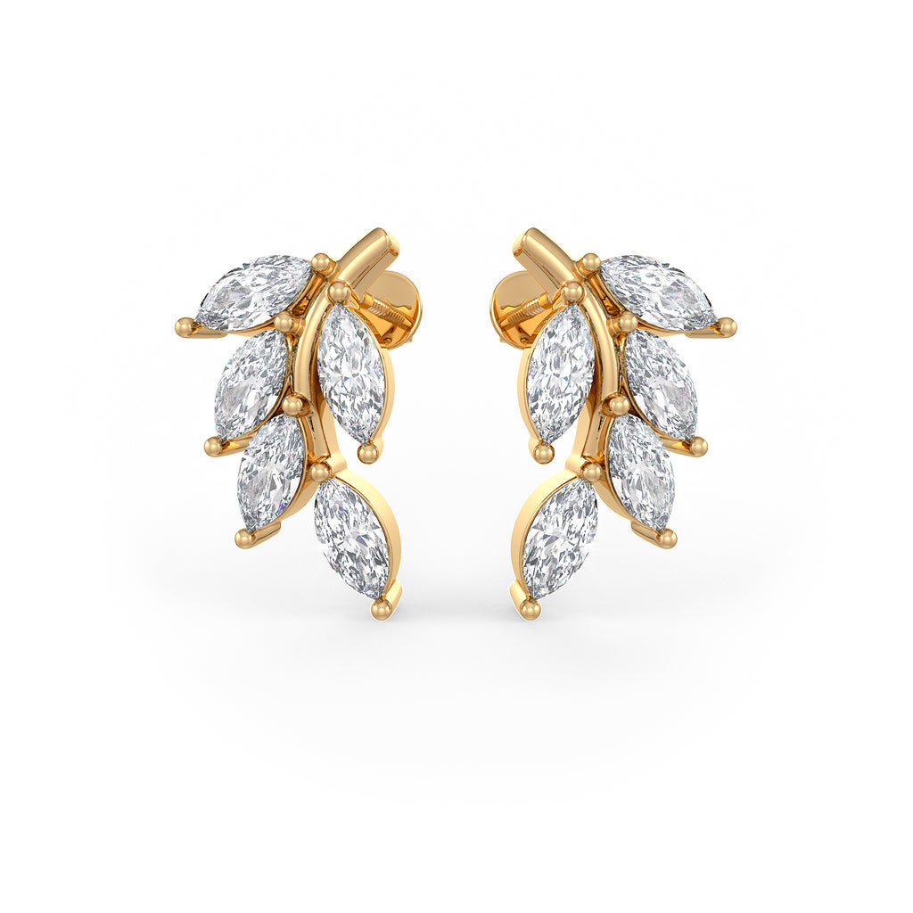 Gold earrings with diamond stones on a white background
