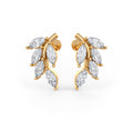 Gold earrings with diamond stones on a white background