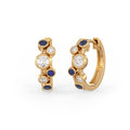 Polished gold hoop profile showing the rounded bubble detailing