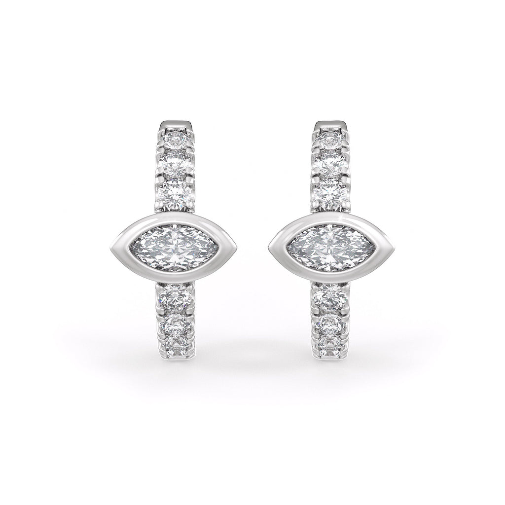 Pair of diamond earrings on a white background