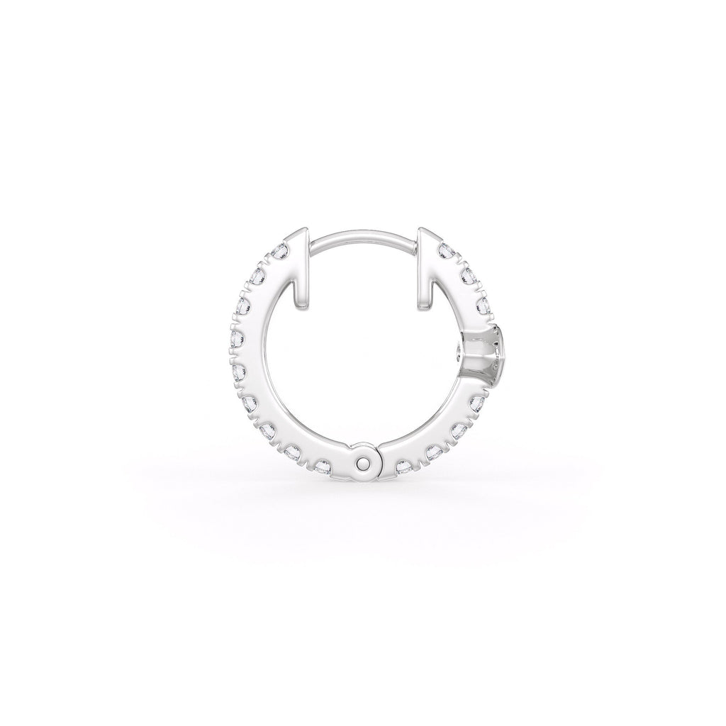 Silver hoop earring on a white background