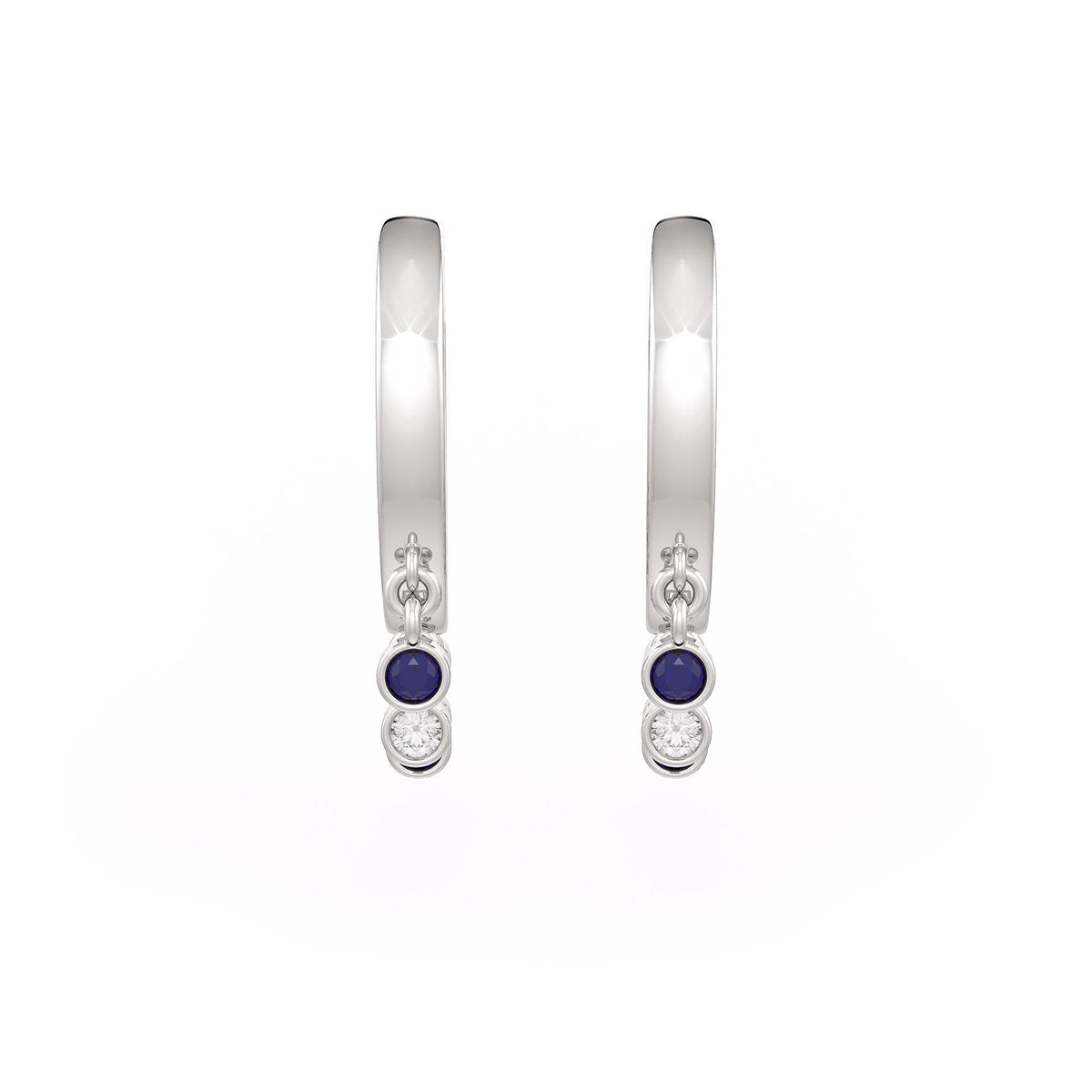 Pair of silver hoop earrings with blue gemstones on a white background