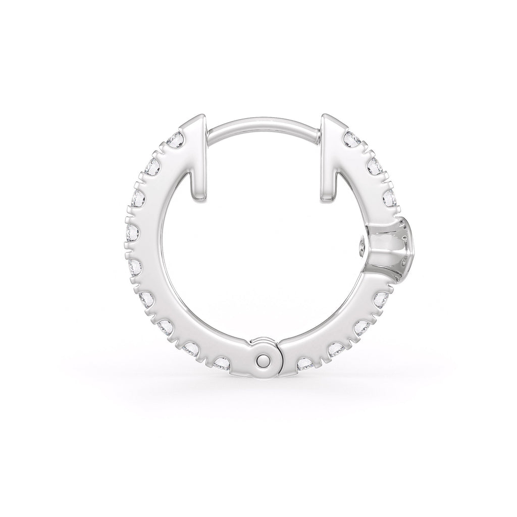 Silver hoop earring on a white background