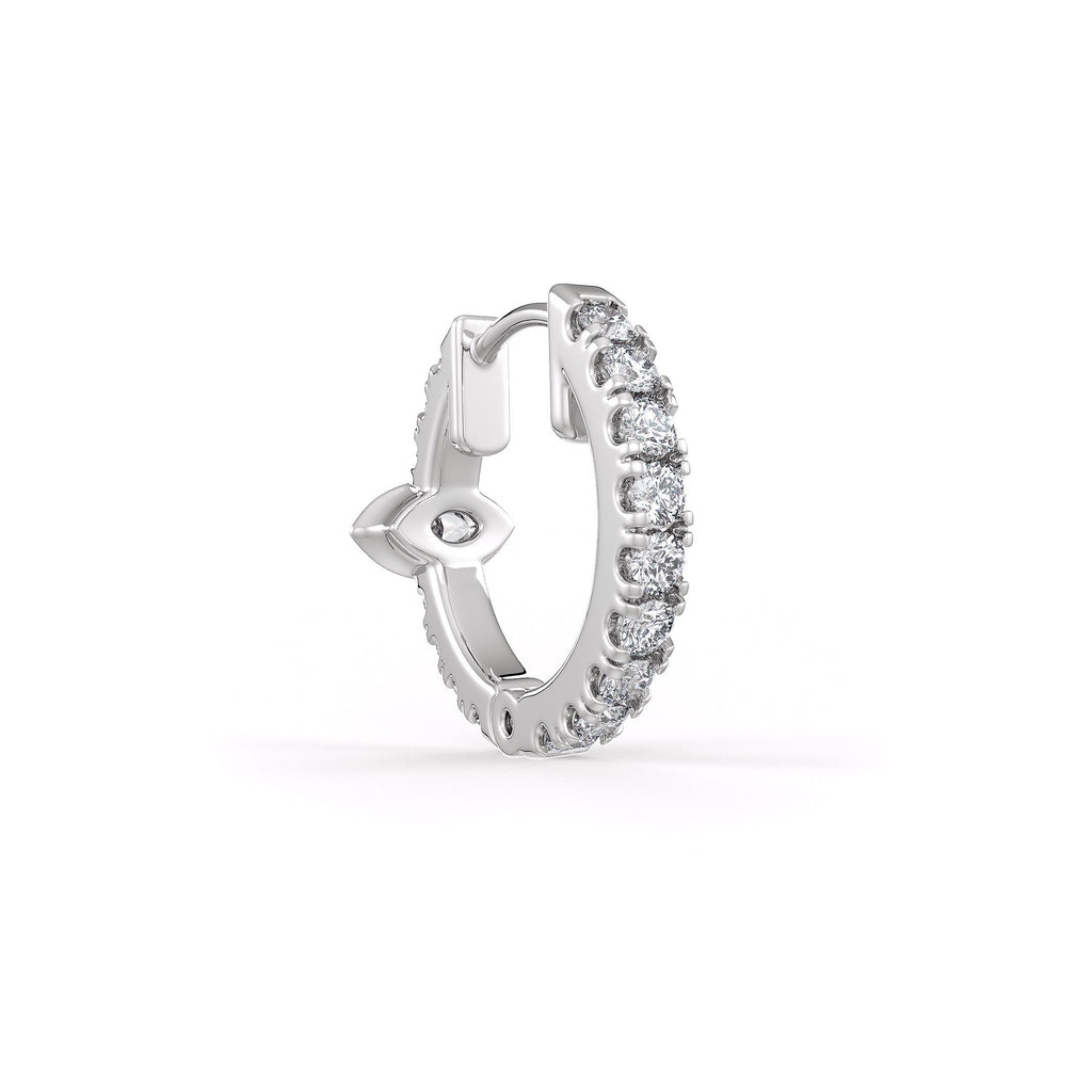 Hoop earring with small diamonds on a white background