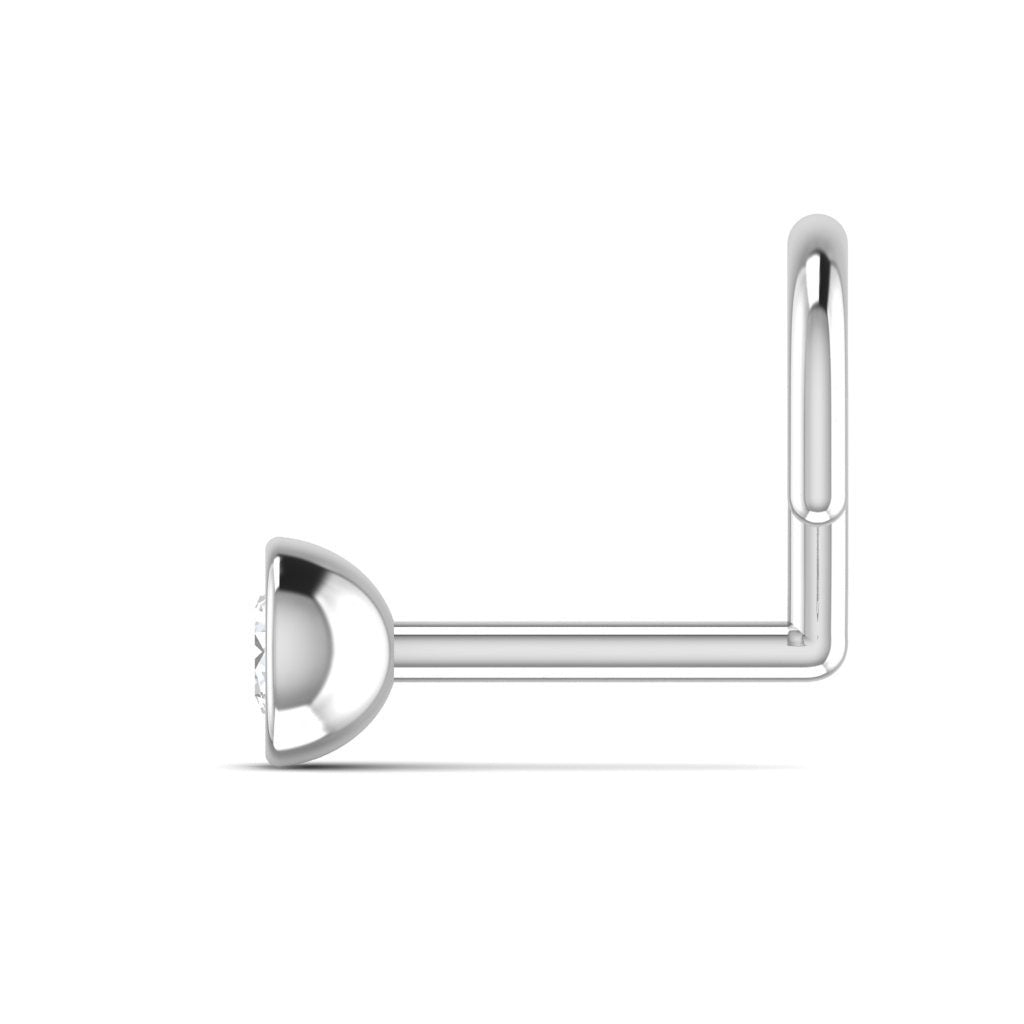 Silver nose ring on a white background
