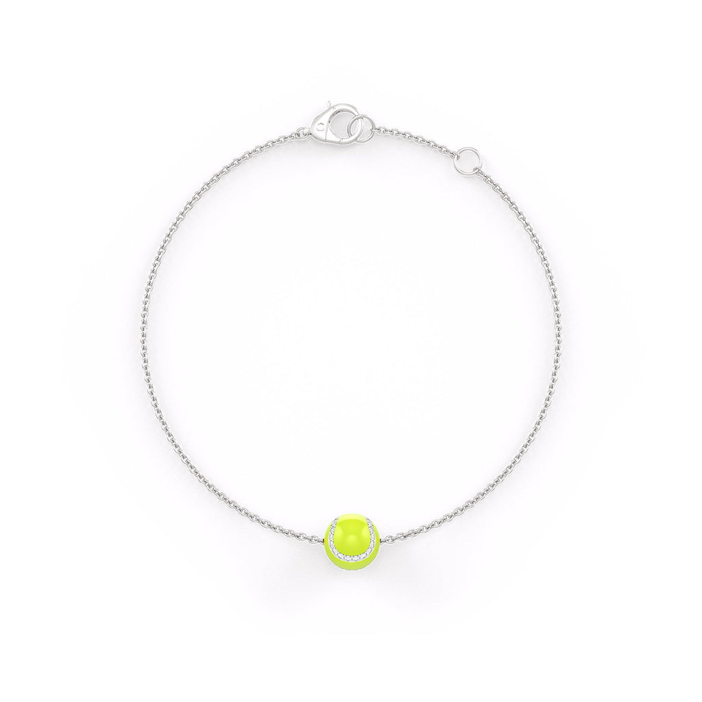 Silver bracelet with a green bead on a white background