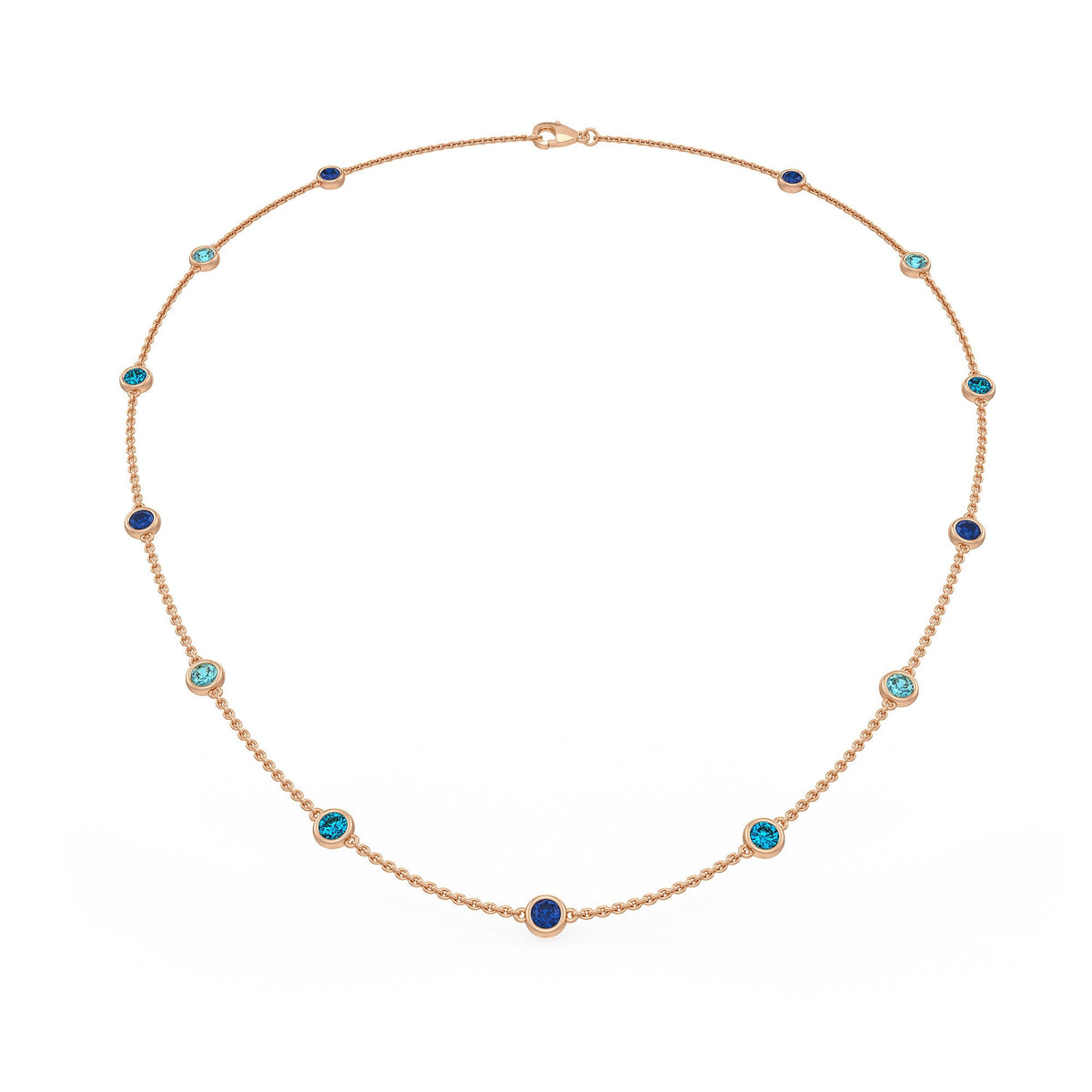 18ct rose gold necklace with Blue Sapphire, Blue Topaz and Aquamarine