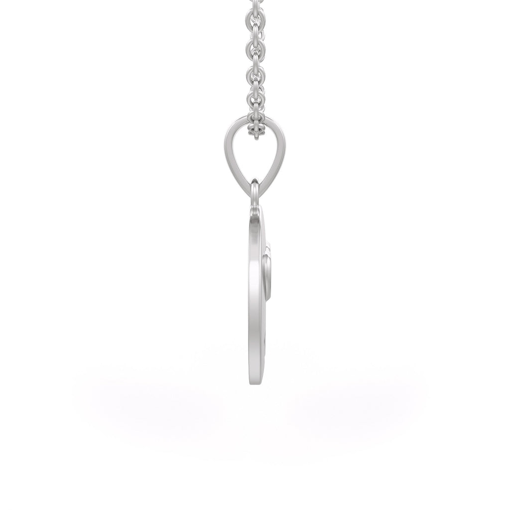 Side view of white gold emoji pendant