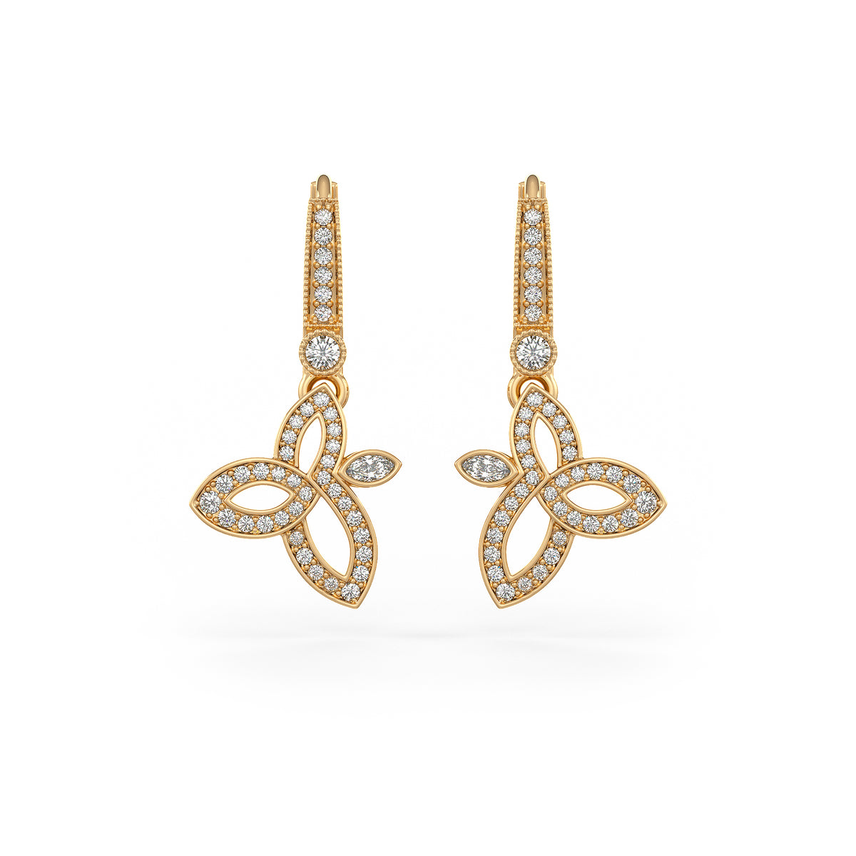 Gold earrings with diamond accents on a white background