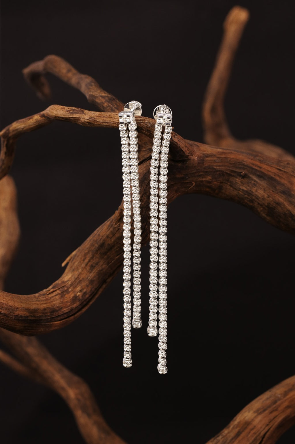 Long drop diamond earrings