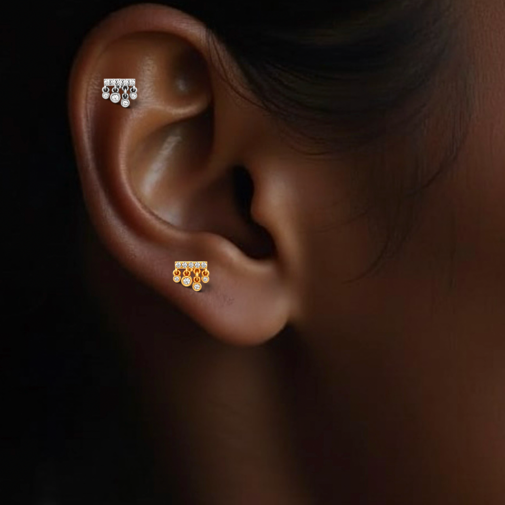 Delicate diamond cartilage earring in polished white gold
