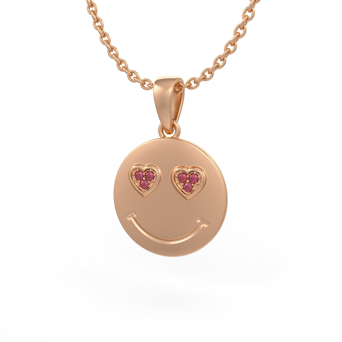 Rose gold smiley face pendant with heart shaped gemstones and pink stones