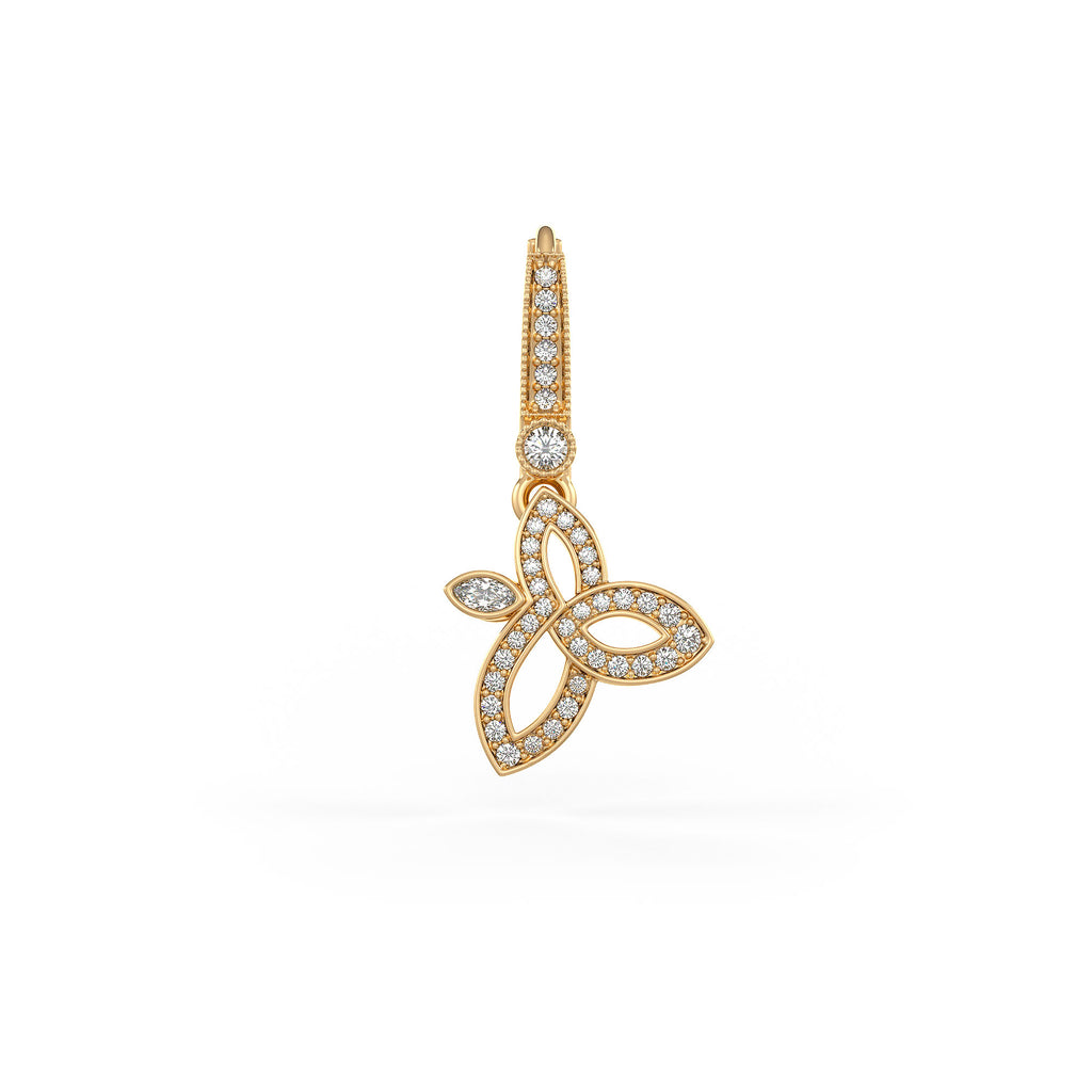 Gold earring with diamond accents on a white background