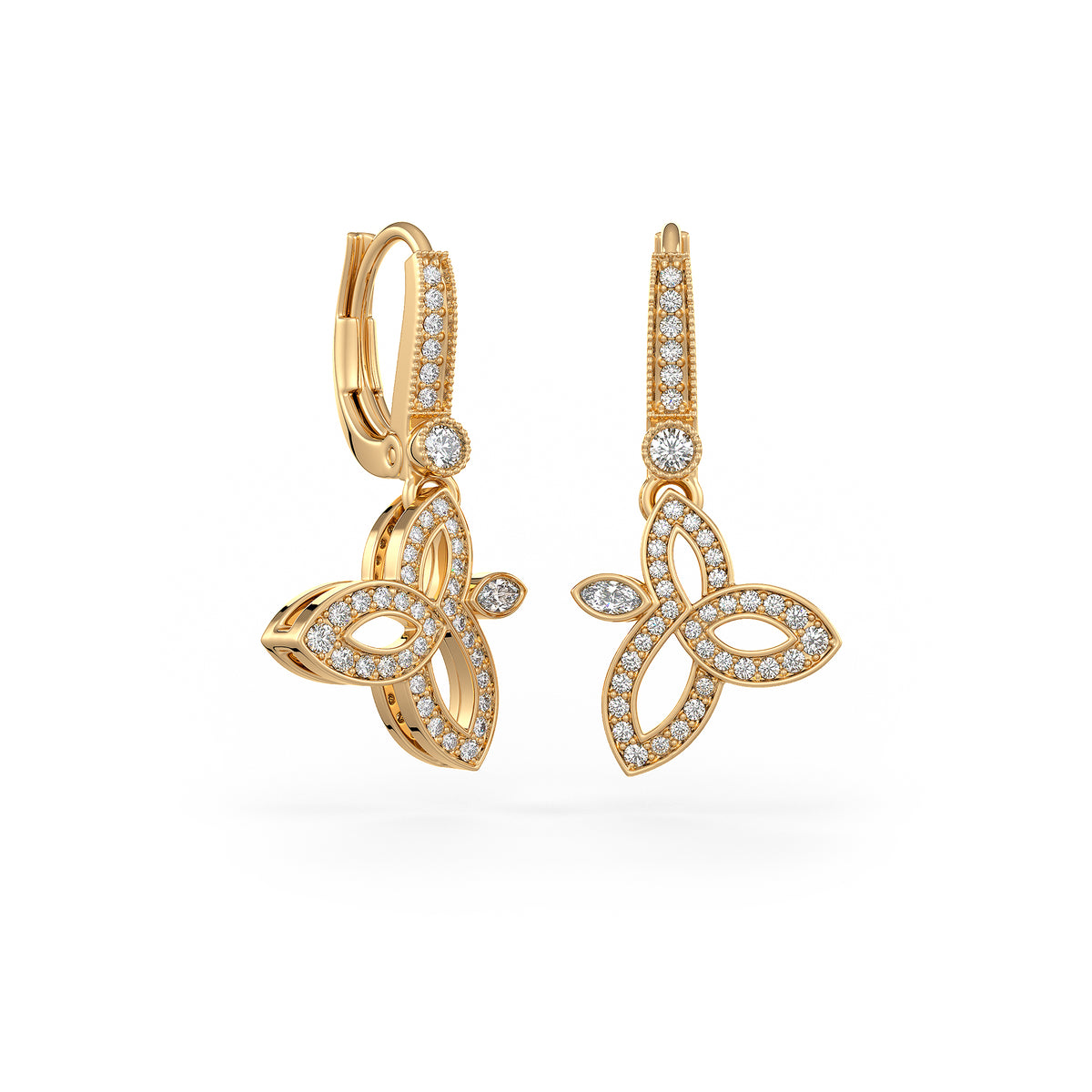 Gold earrings with diamond accents on a white background