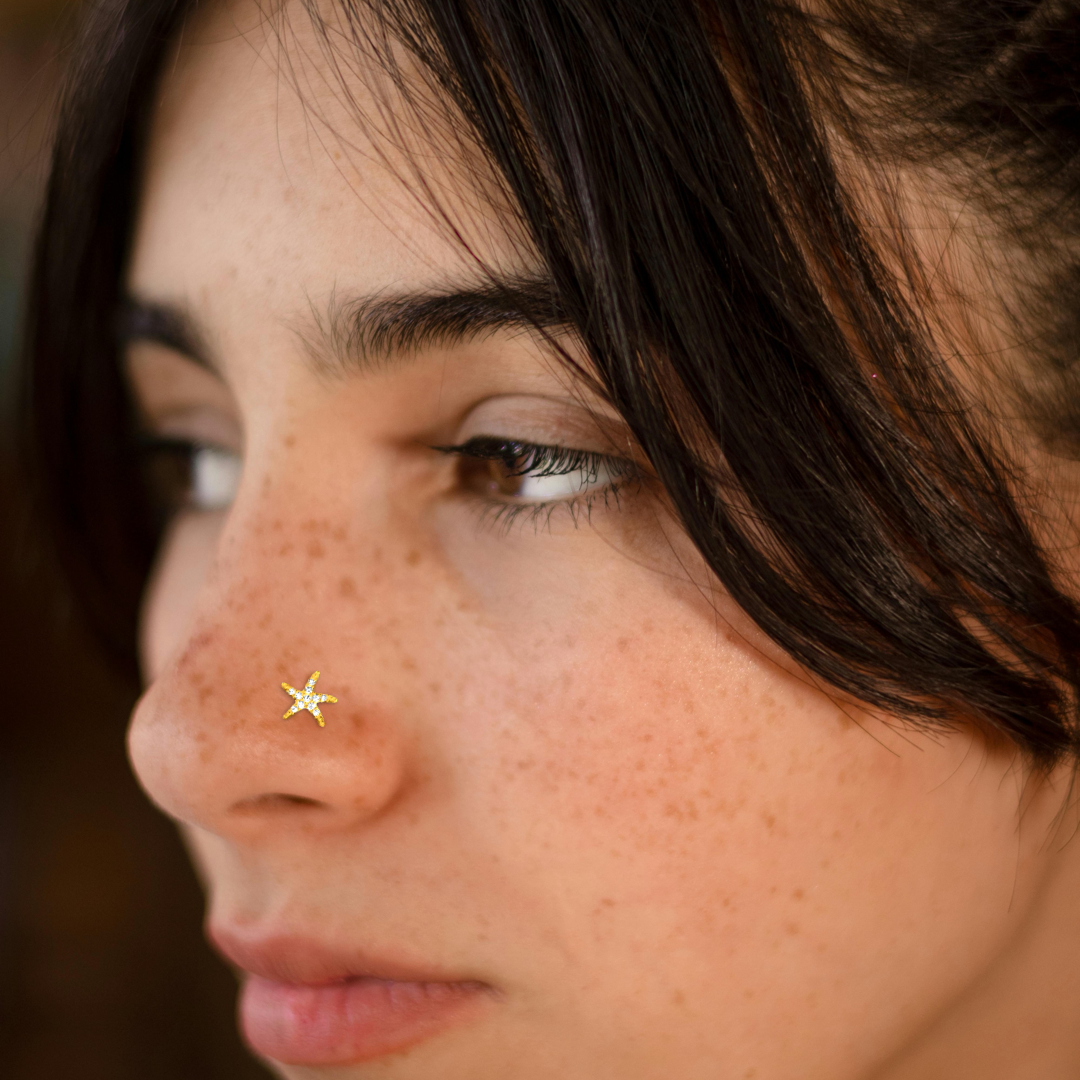 Luxury starfish nose stud in yellow gold