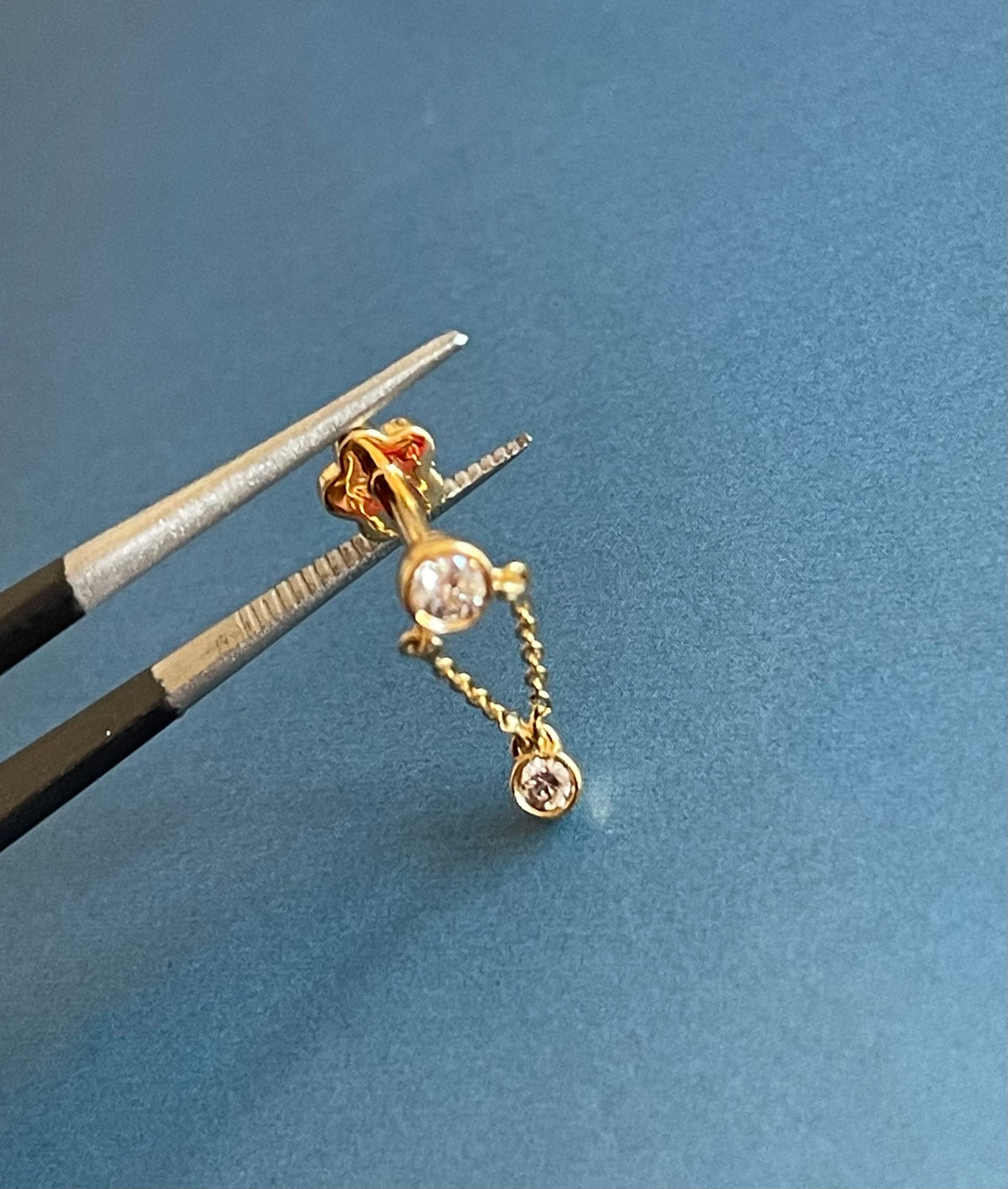 0.11ct diamond single drop earring