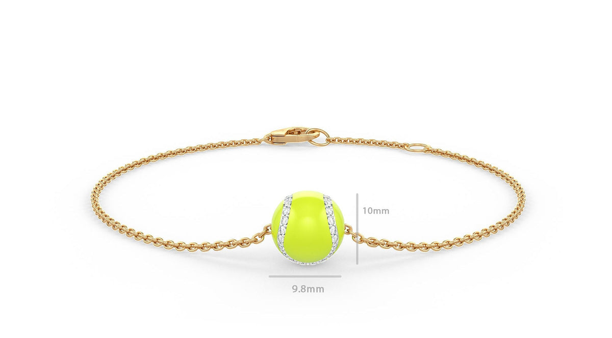 Gold bracelet with a green tennis ball charm on a white background
