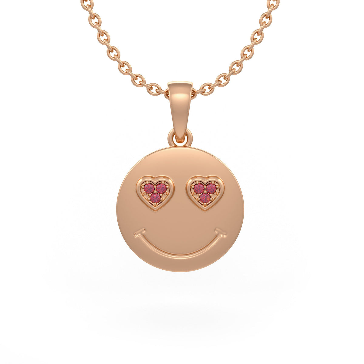Rose gold smiley face pendant with heart shaped eyes on a white background