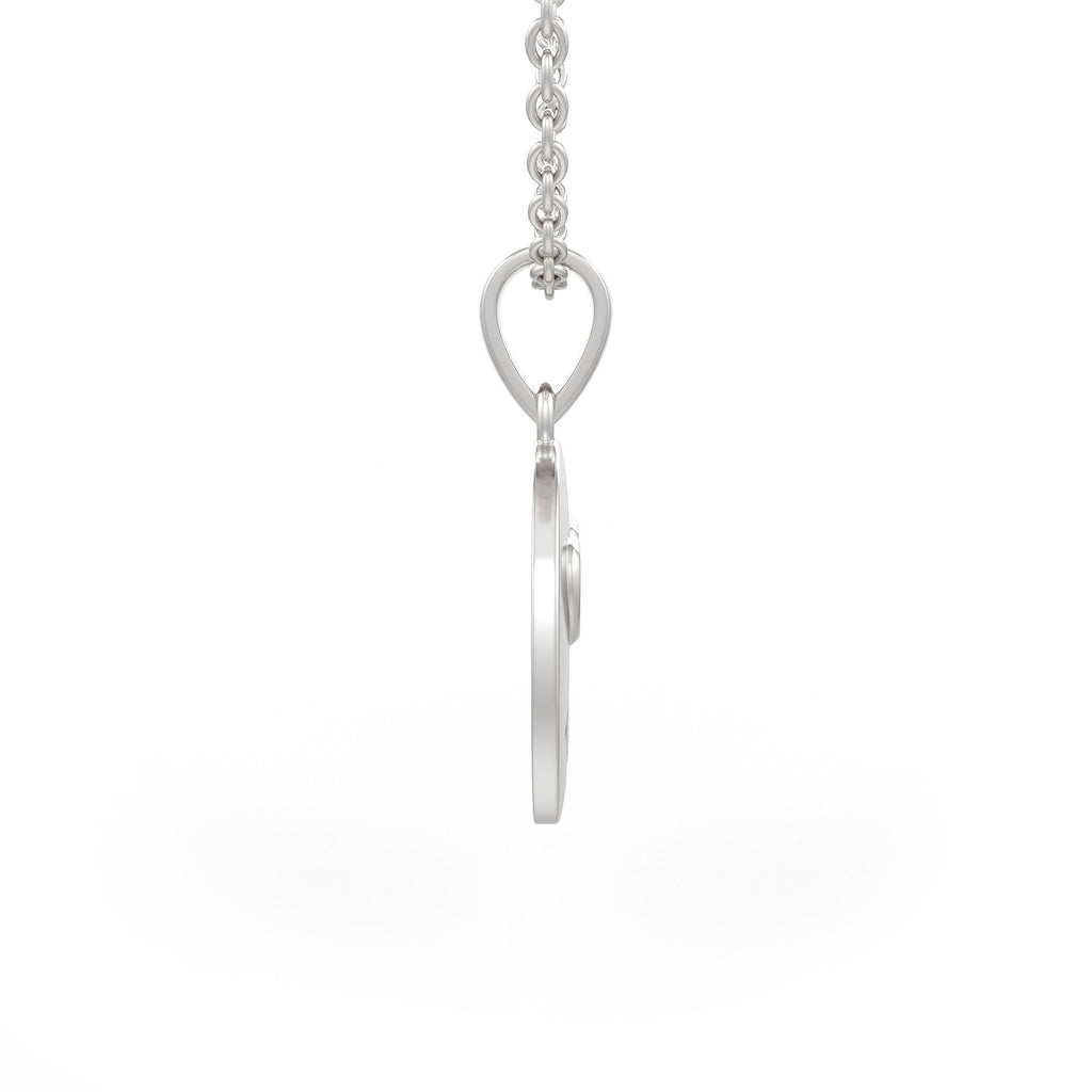 Close up of diamond smiley face jewellery pendant