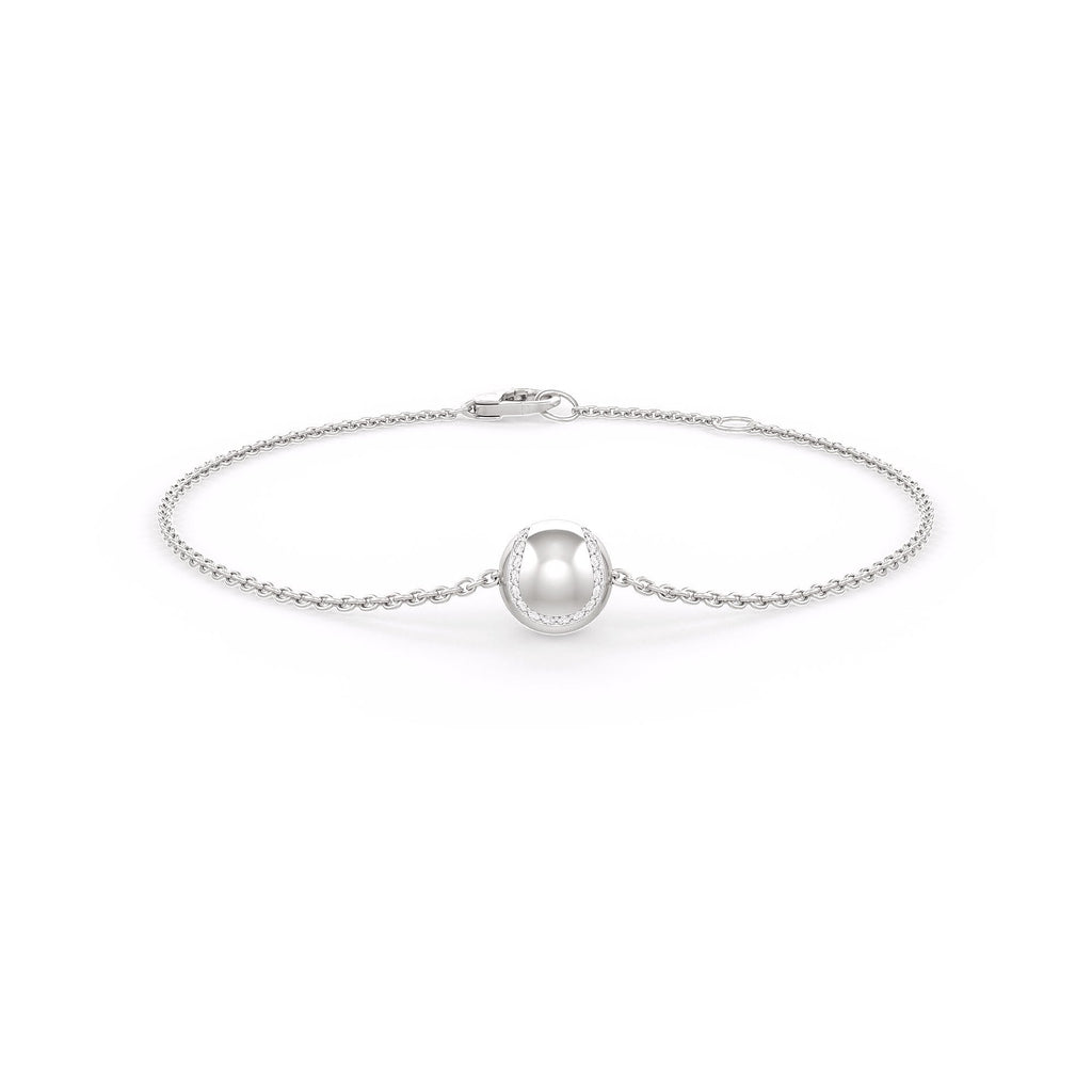  Beautiful bracelet with a single pearl on a white background
