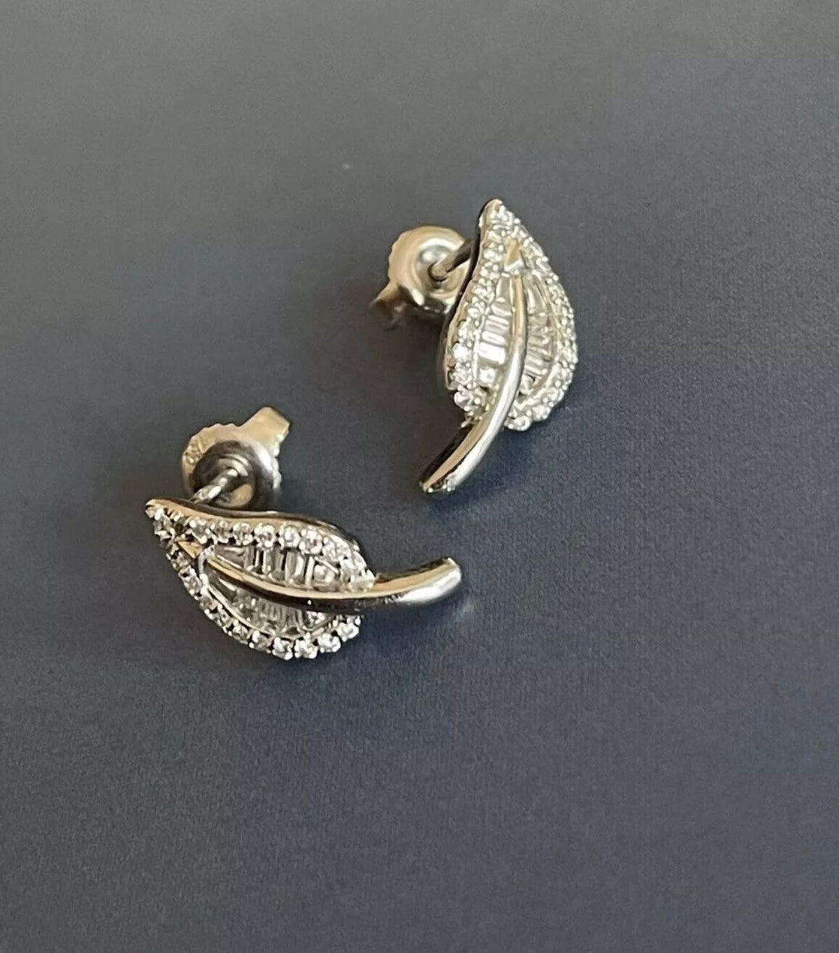 Diamond leaf stud earrings