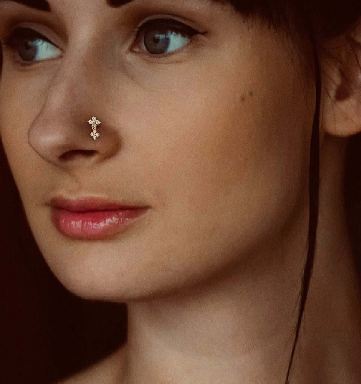 Diamond floral nose stud with daisy design in rose gold