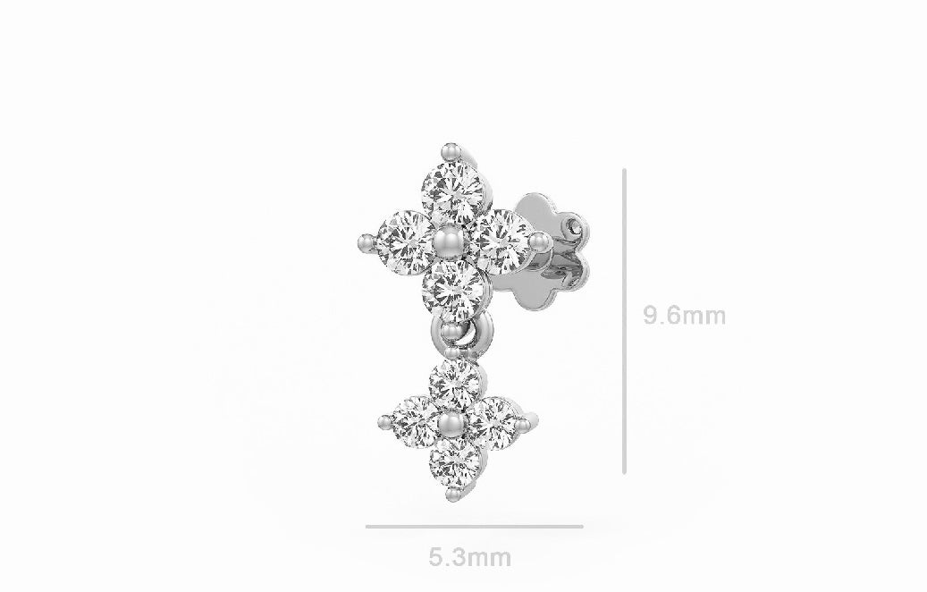 Daisy drop nose stud with clear gemstones on a white background