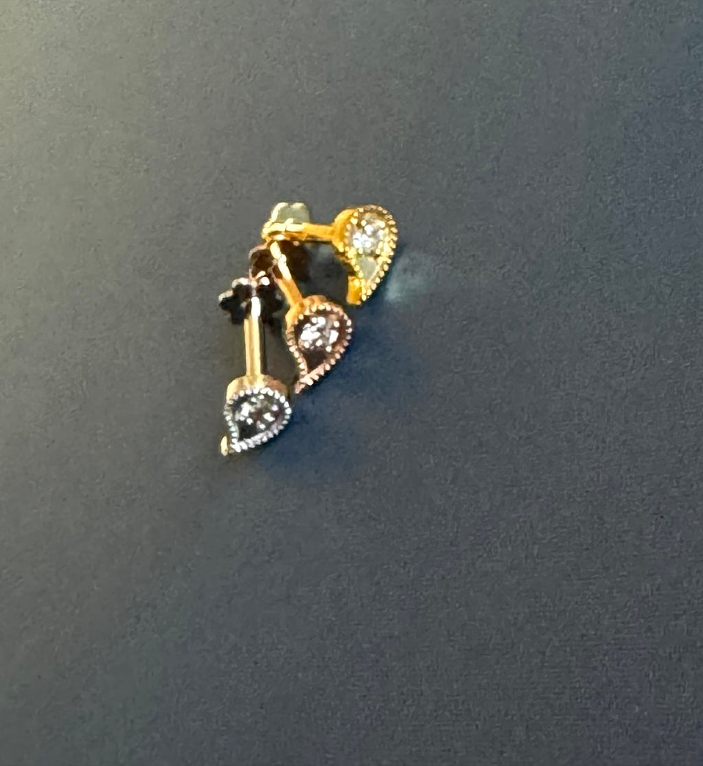 Diamond nose stud on a dark gray background