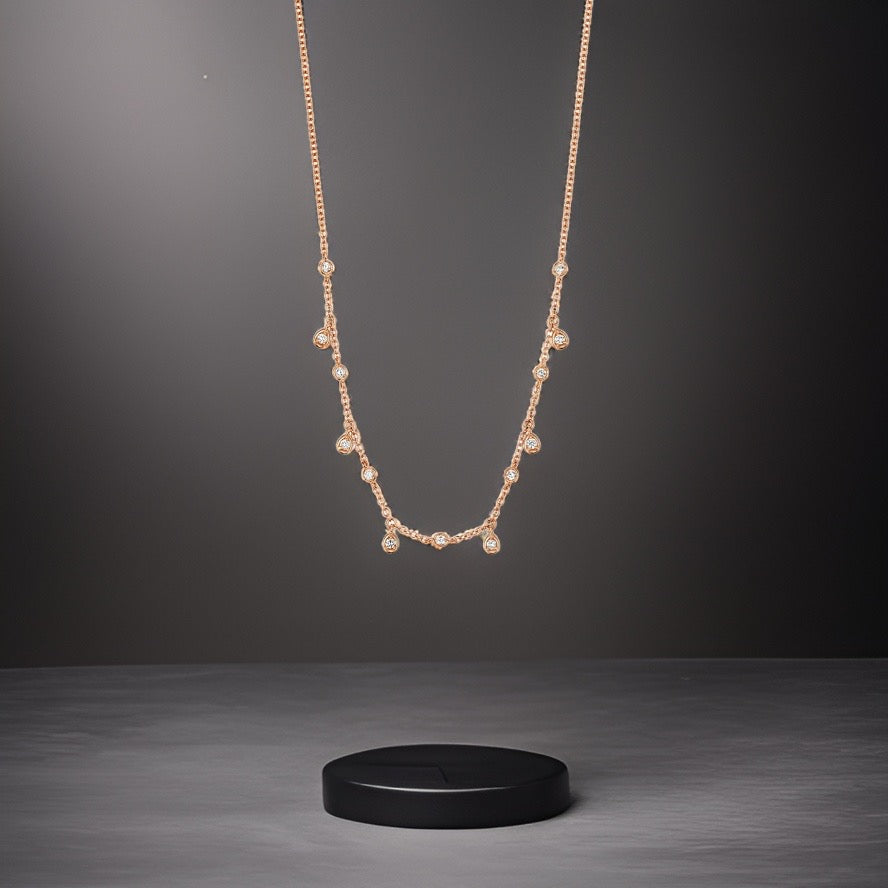 Refined bezel-set diamond necklace in gold