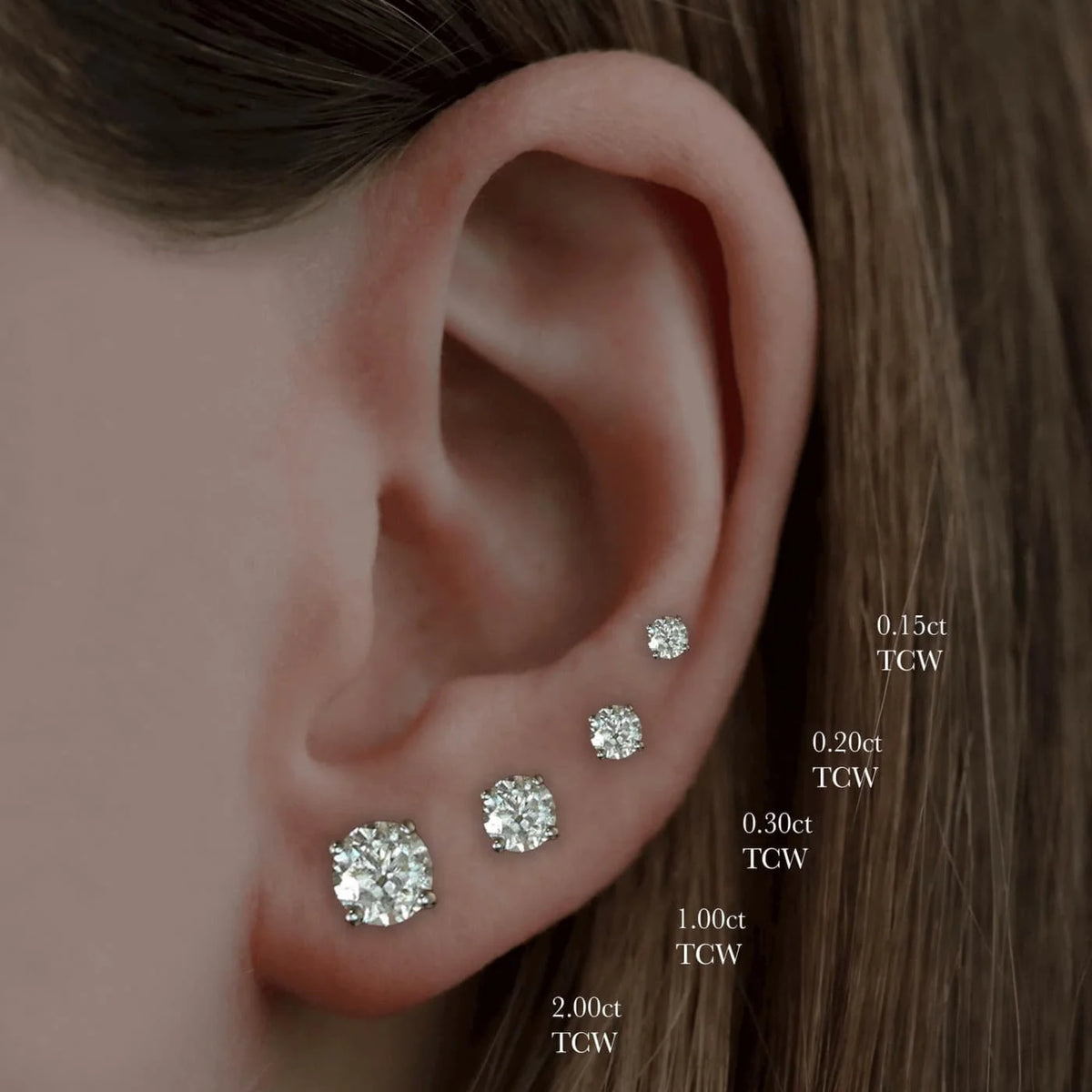 Boucles d'oreilles solitaire diamant halo caché