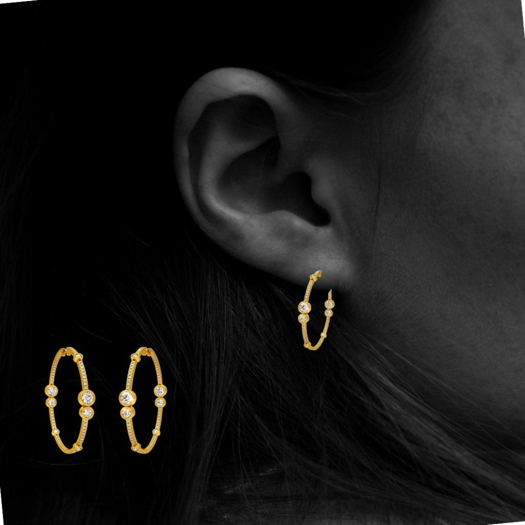  Orecchini a cerchio con diamanti a bolla da 1,30 ct in oro giallo