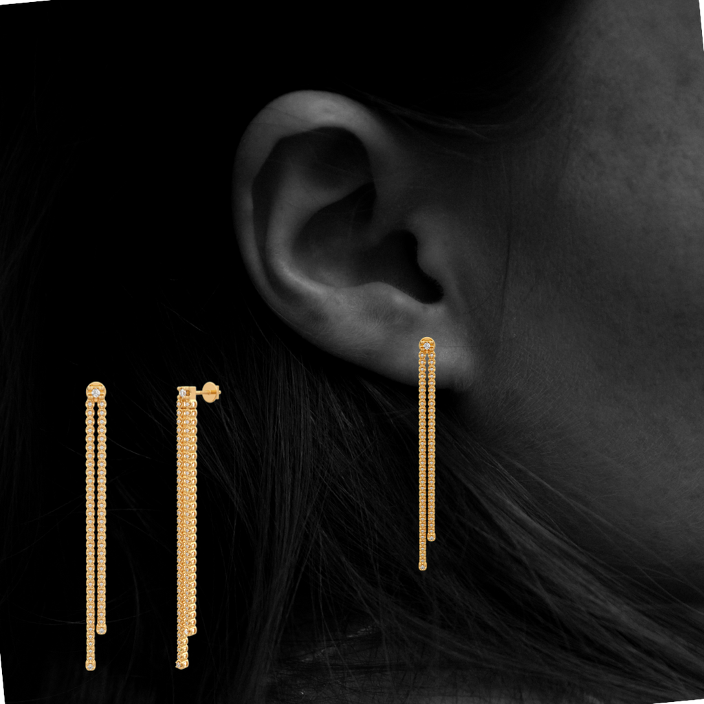 Long drop diamond earrings yellow gold