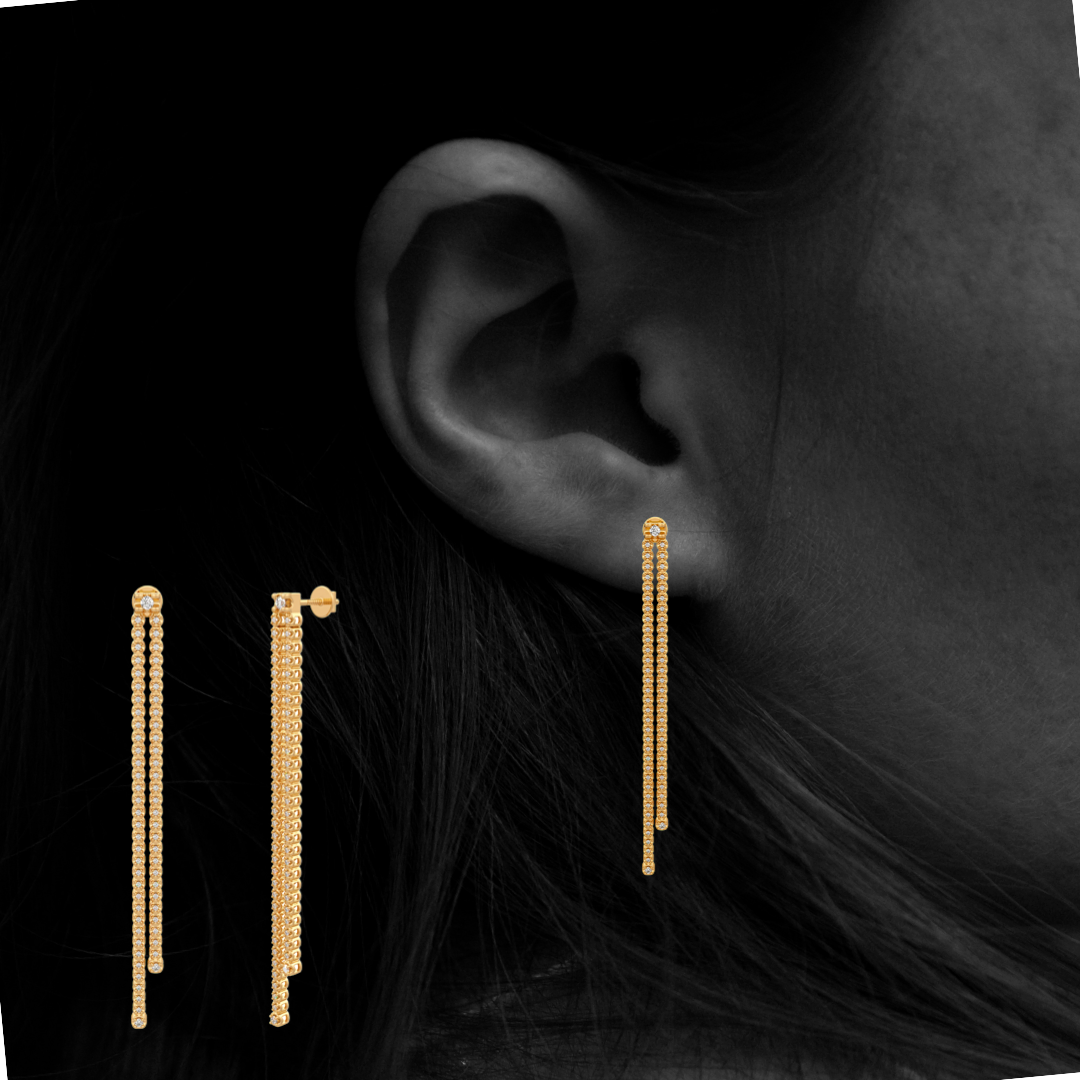 Long drop diamond earrings yellow gold