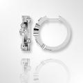 Boucles d'oreilles créoles en or blanc serties de diamants (0,70 ct).