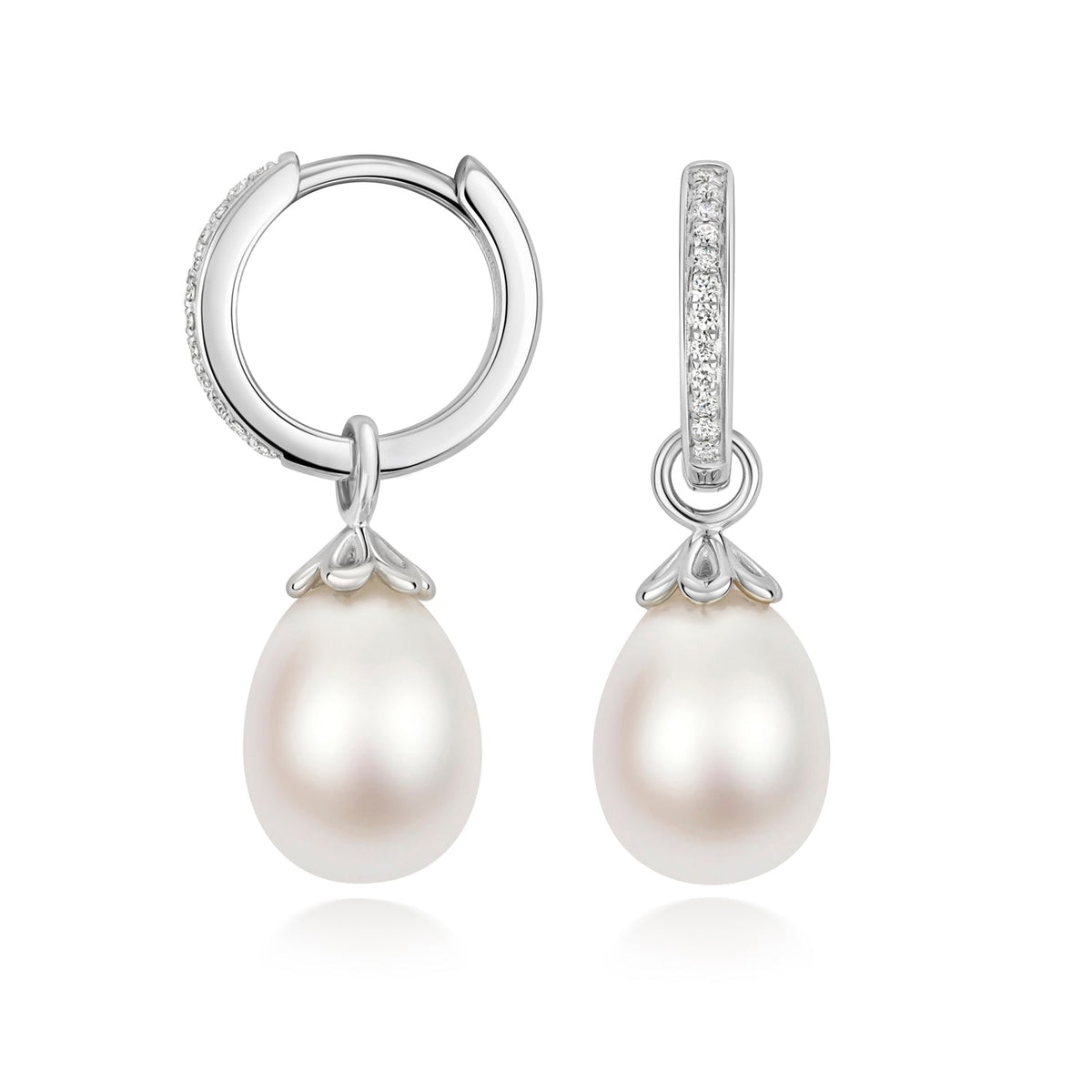 Silver earrings featuring lab-grown diamond accents and oval freshwater pearls from Hatton Garden Collection.