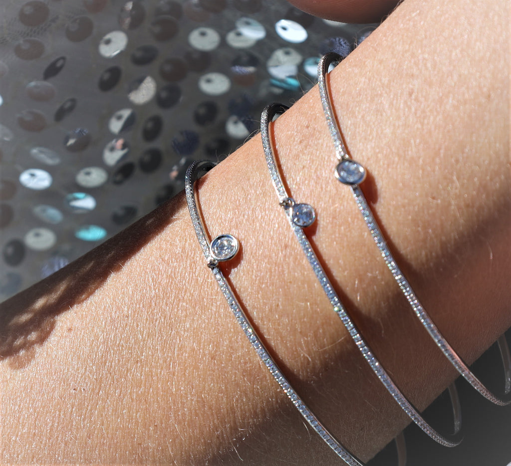 White Gold Eternity Diamond Bangle with solitaire charm