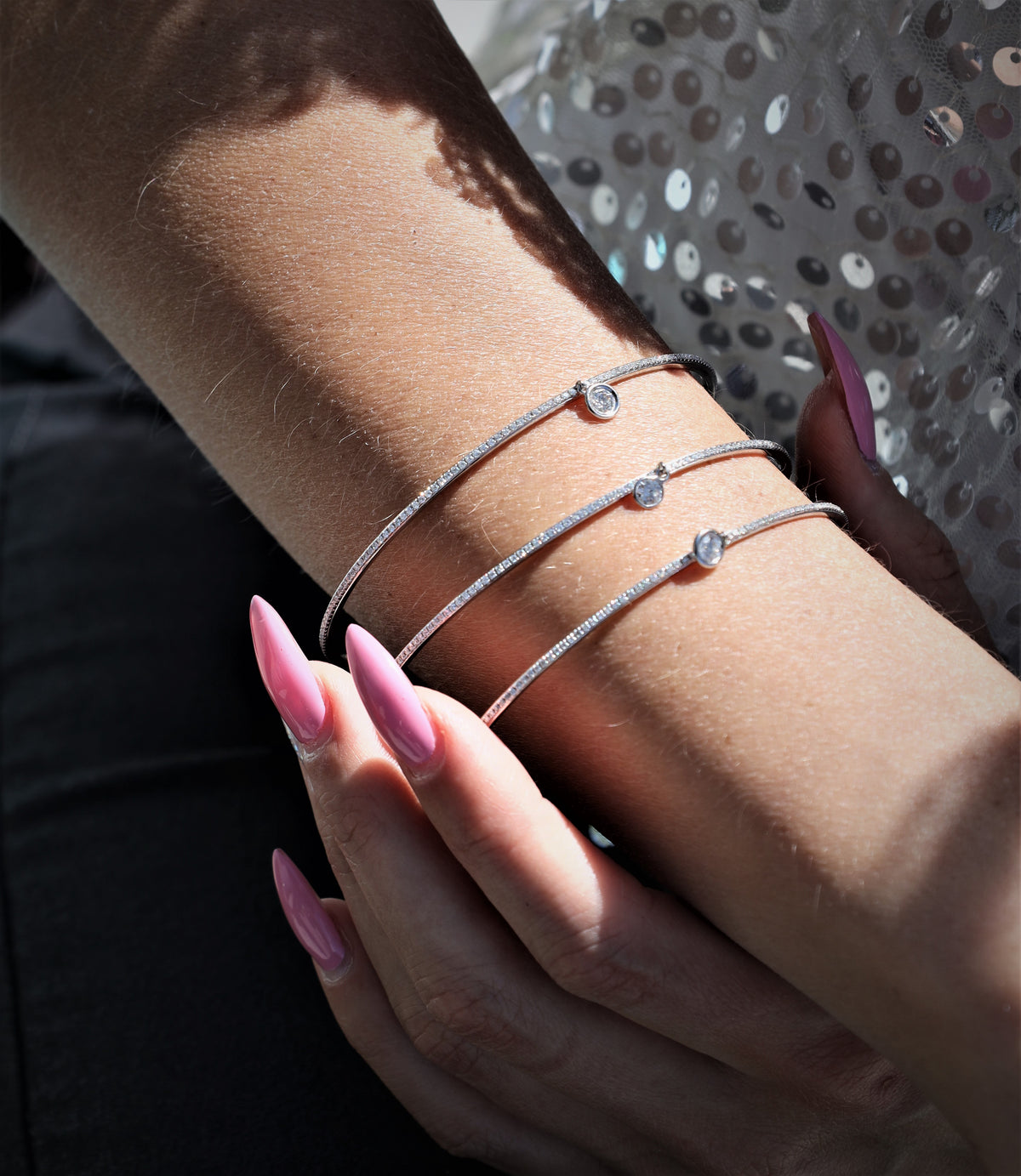 White Gold Eternity Diamond Bangle with solitaire charm
