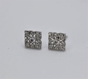 White gold intricate earrings 