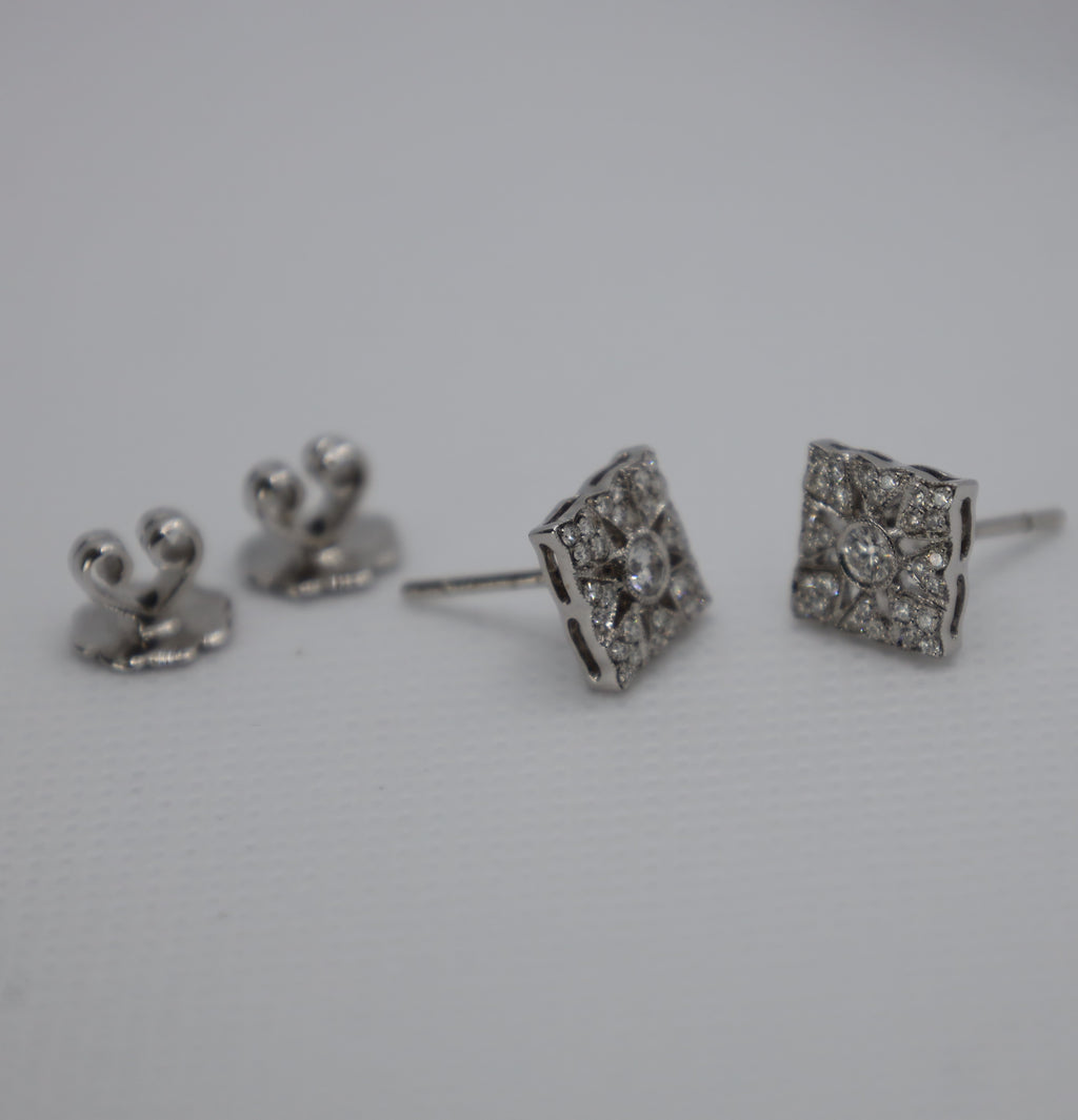 Intricate diamond earrings in luxurious white gold