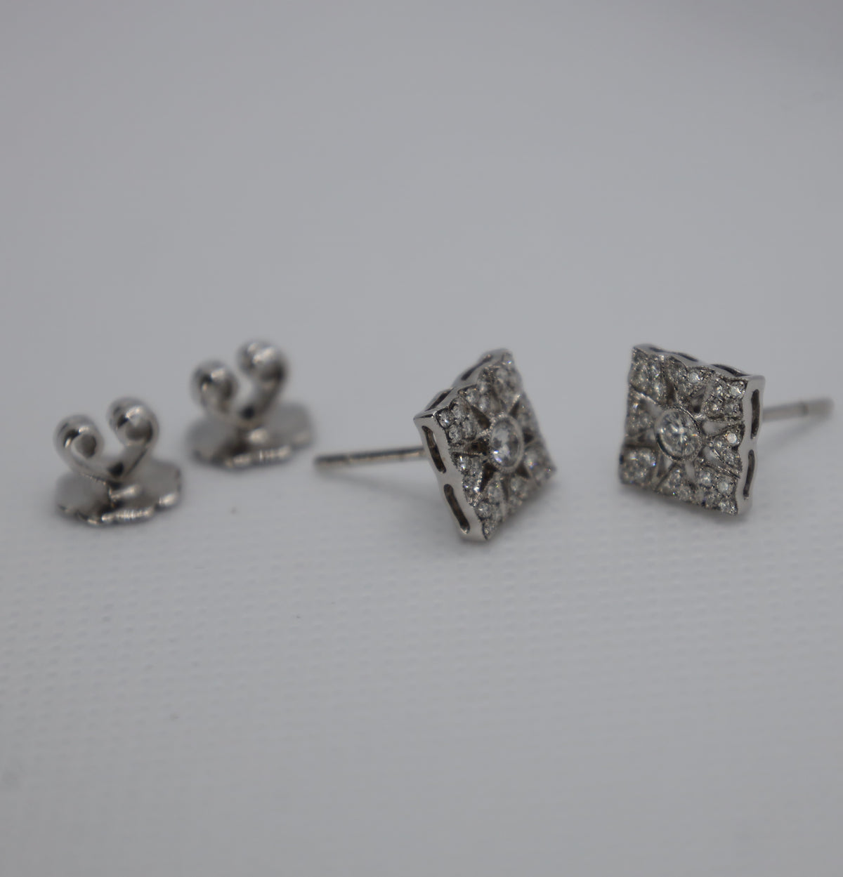Intricate diamond earrings in luxurious white gold