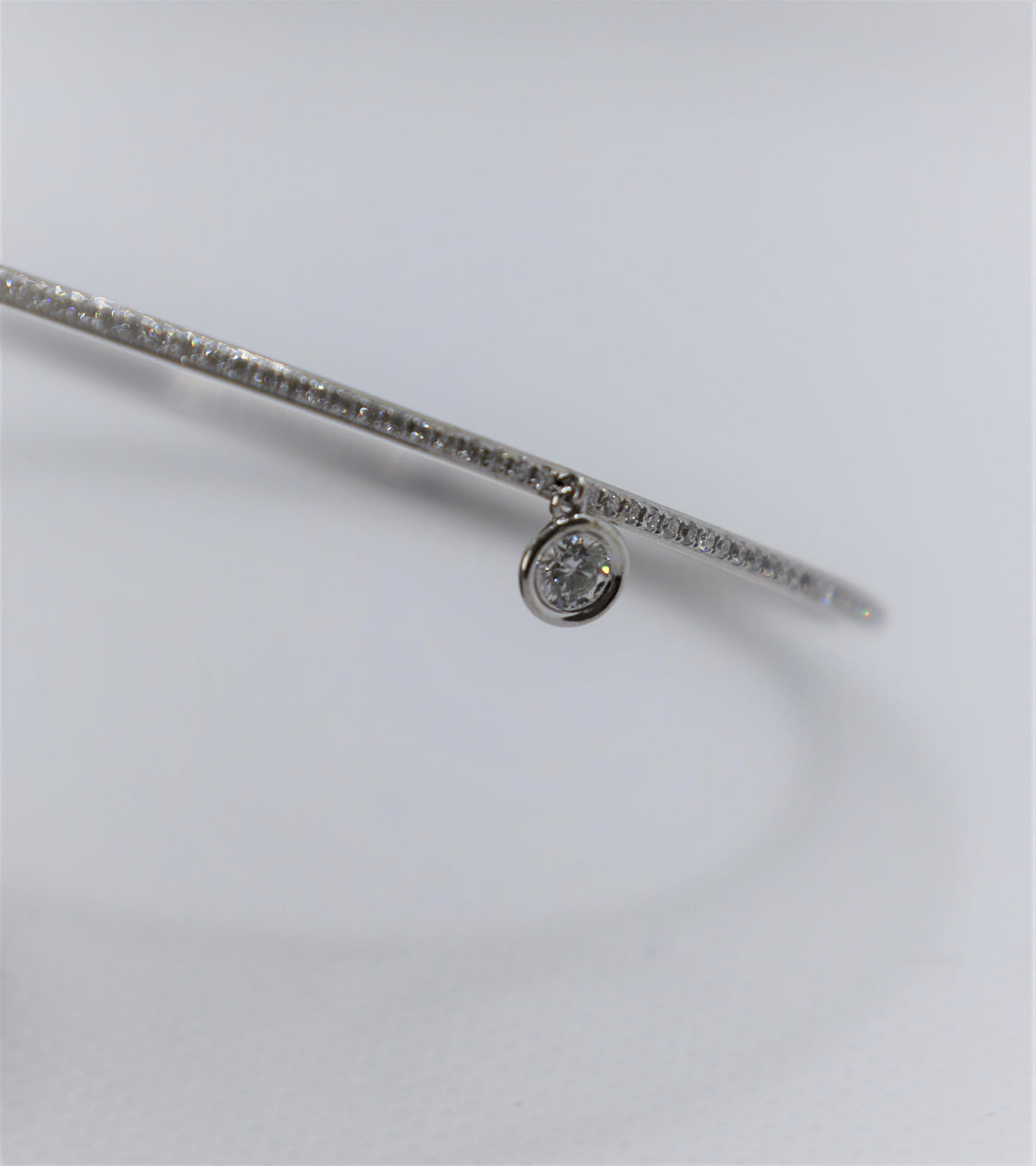 White Gold Eternity Diamond Bangle with solitaire charm