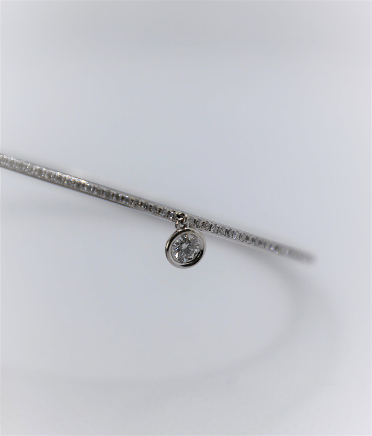 White Gold Eternity Diamond Bangle with solitaire charm