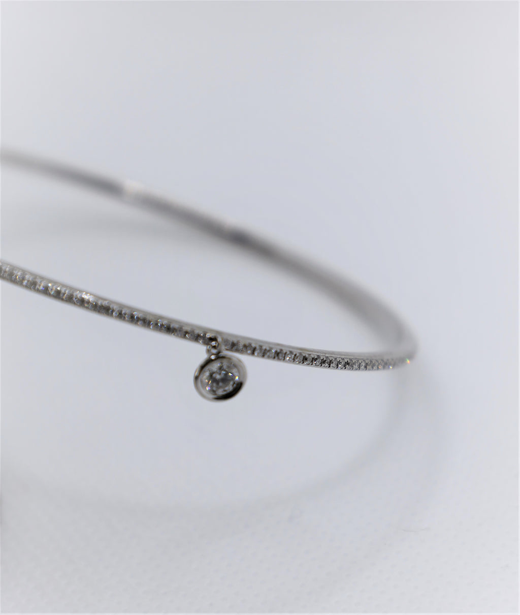 White Gold Eternity Diamond Bangle with solitaire charm