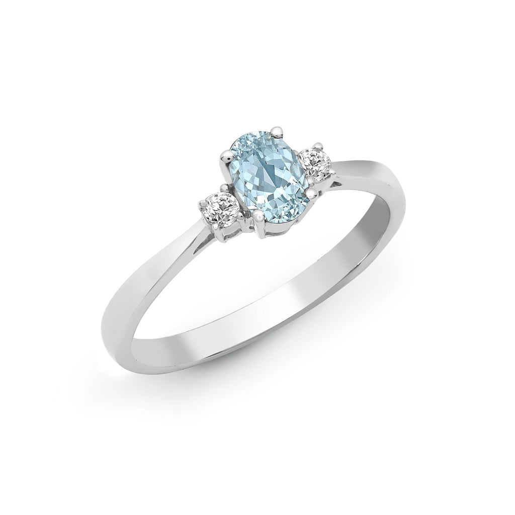 Ring aus 18-karätigem Weißgold mit Diamanten, Aquamarin und drei Steinen