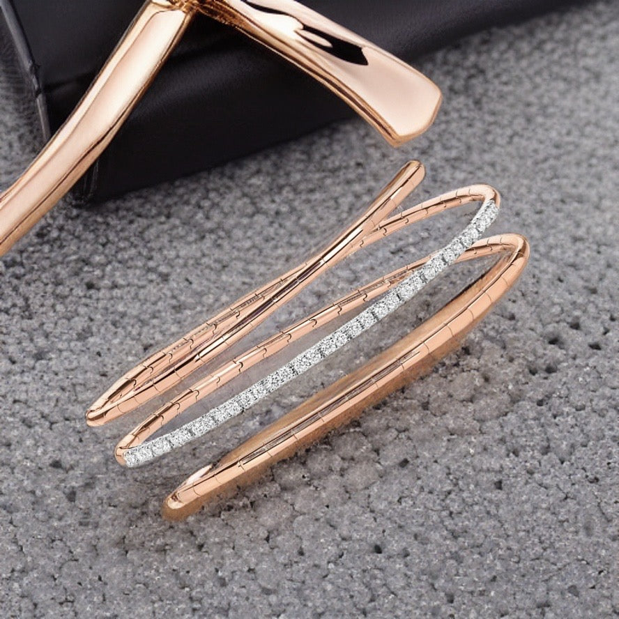 DIAMOND TWIST BANGLE IN 18CT ROSE GOLD